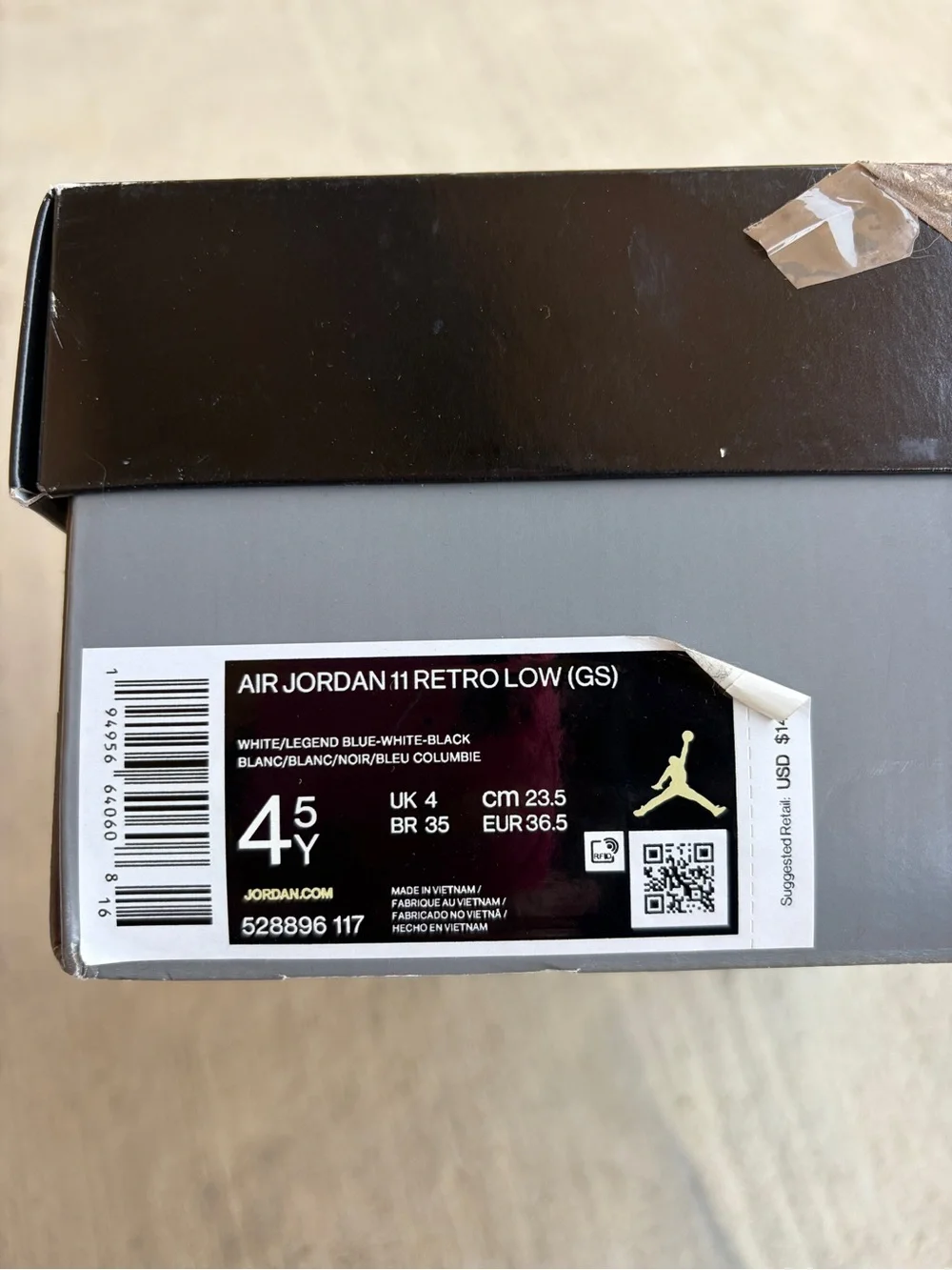 Jordan Kids White and Black Low-Top Sneakers with Light Blue Accents
